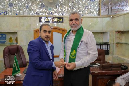 وفد دار القران الكريم في ناحية النصر التابع للتجمع القراني في ذي قار مع مدير تربية الرفاعي